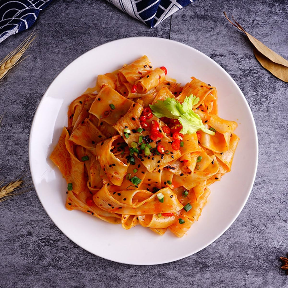 Yummy99 Akuan Sichuan red oil pour adds fiery aroma.
