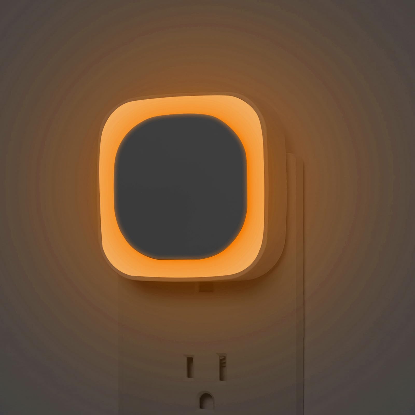 YUNLEX amber night light fits outlets for tidy bedroom illumination and safe navigation.