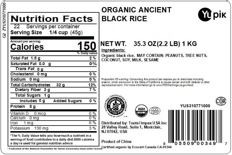 Cooked Yupik black rice turns purple with a nutty aroma, ideal for bowls.