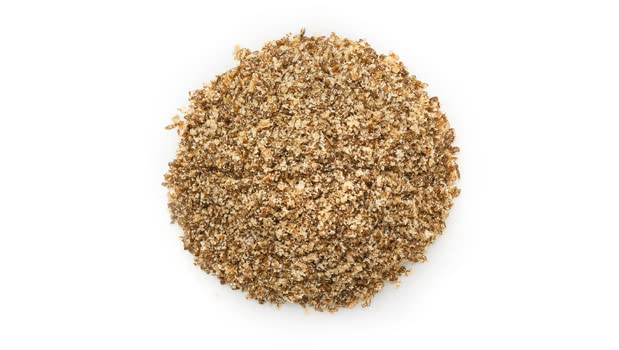 Yupik chia seed powder close-up showing black and white seeds.