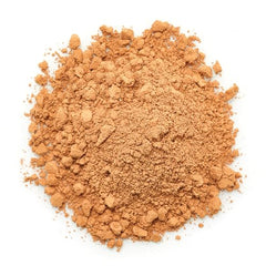 Yupik cocoa powder texture close-up showcasing rich color for beverages.