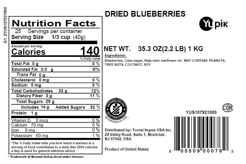 Yupik dried blueberries pouring into cereal for a fruity topping.