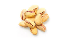 Yupik dry roasted pistachios in-shell on a tray ideal for sharing.