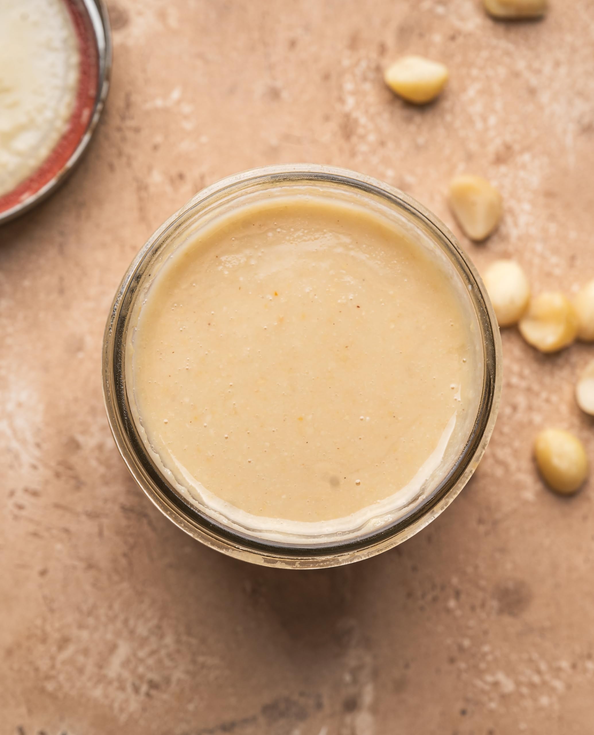 Yupik macadamia nuts, crunchy texture close-up, great for toppings and recipes.