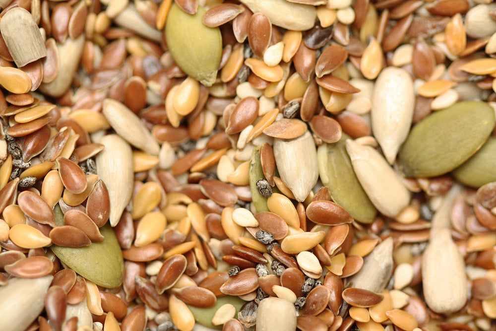 Yupik Organic 6 Seeds Mix sprinkled over oatmeal for a fiber-rich Breakfast