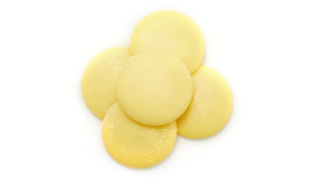 Yupik Organic Cocoa Butter Wafers melting action demonstrates quick incorporation into recipes.