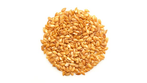 Yupik Golden Flax Seeds ground in a bowl for baking and smoothies.