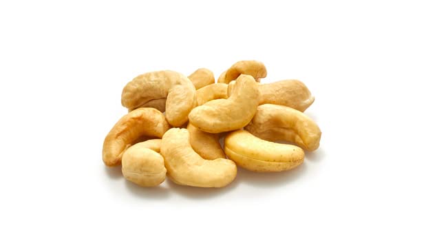 Yupik Organic Raw Cashews held in hand, versatile for recipes or toppings.