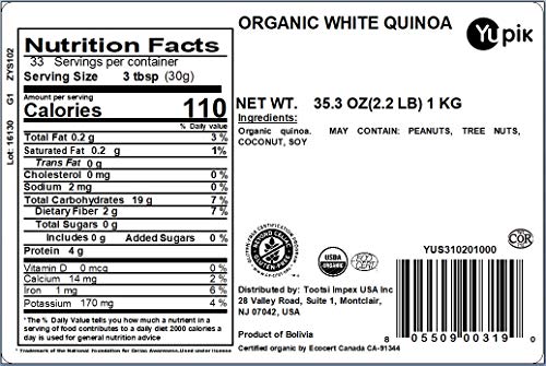 Yupik Organic White Quinoa raw grains close up, rich in fiber