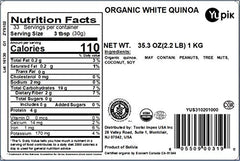 Yupik Organic White Quinoa raw grains close up, rich in fiber