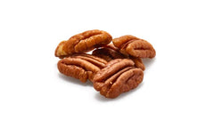 Yupik shelled halved pecans in a bowl ready to mix into recipes