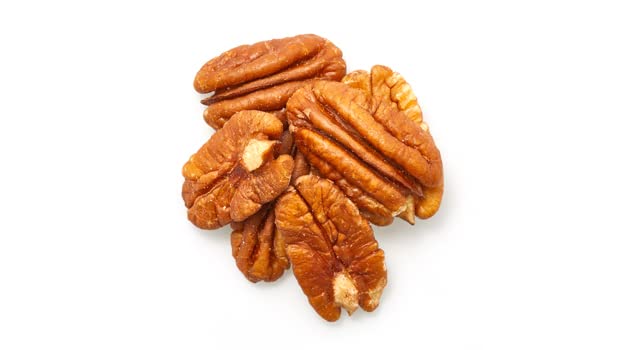 Yupik raw pecans halves on shelf for long-term pantry use