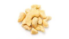 Close-up of Yupik cashews butts showing thick ends and buttery texture.