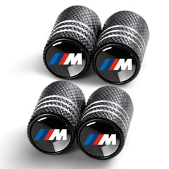 YUIQIEUY tire valve caps in black aluminum with durable anodized finish for BMW and more.