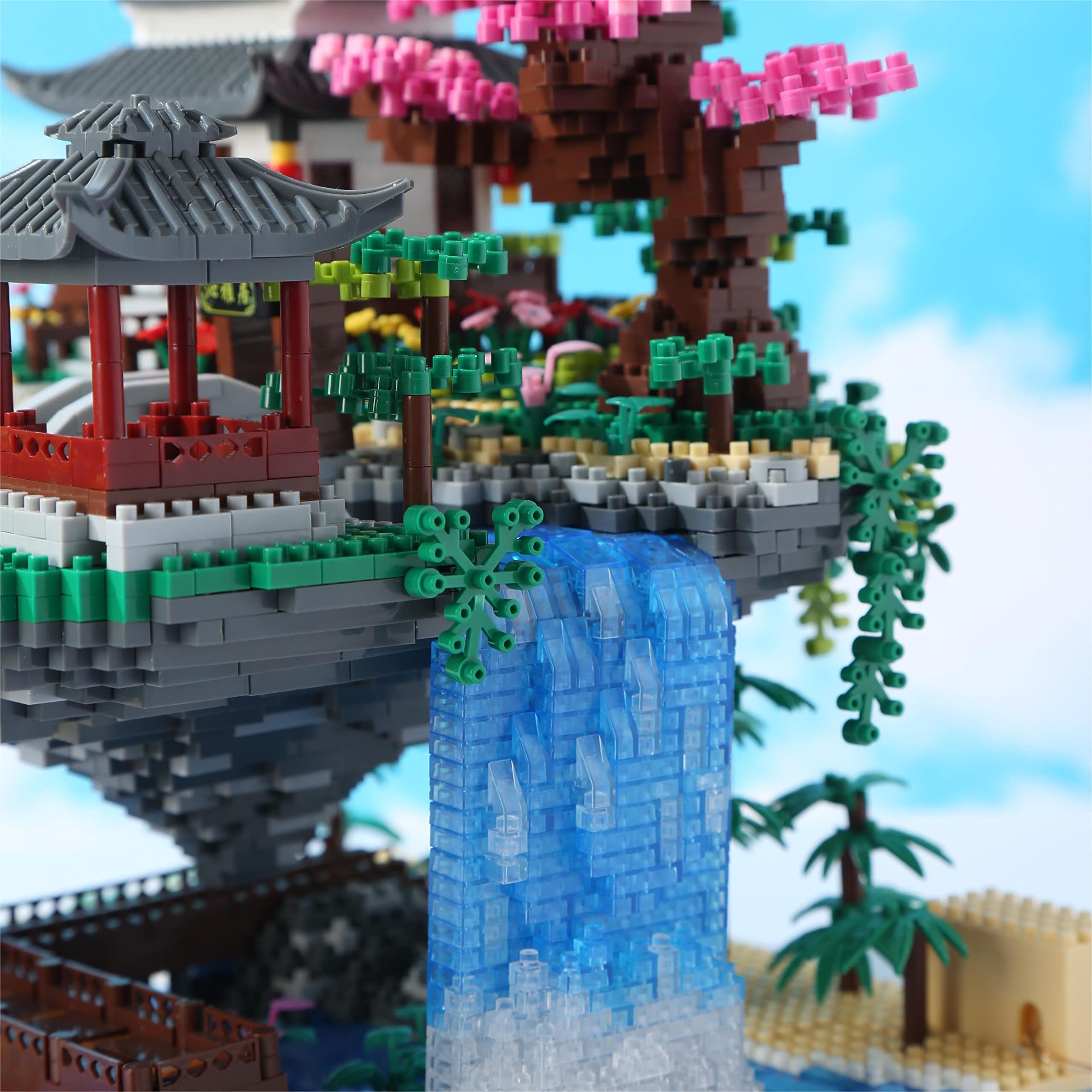 Yushinv completed cherry tree house displayed on a shelf as decor.