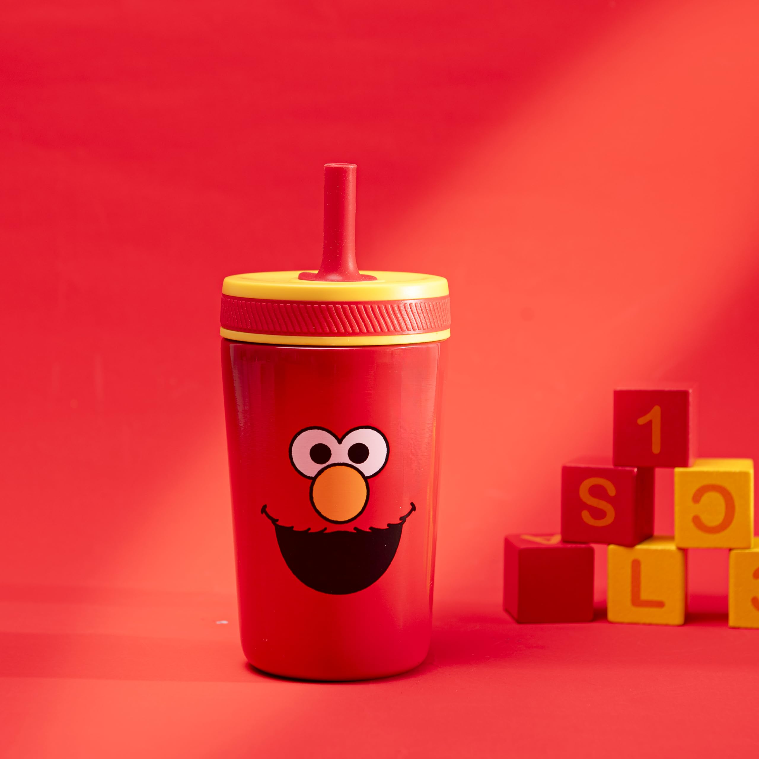 Elmo toddler cup side view highlighting vacuum insulation and cold drinks