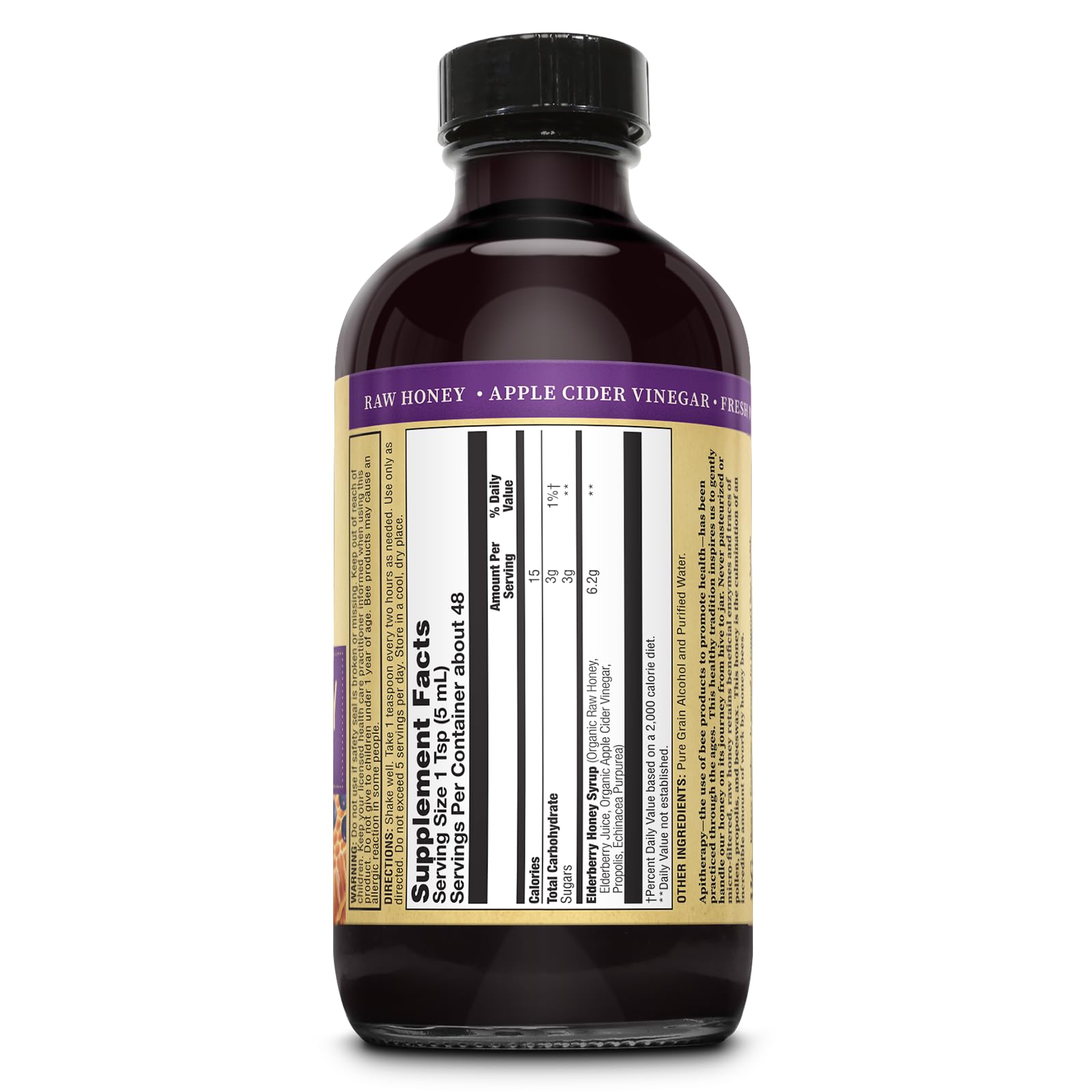 ZAND Elderberry and Honey Immune Syrup being poured for everyday use.