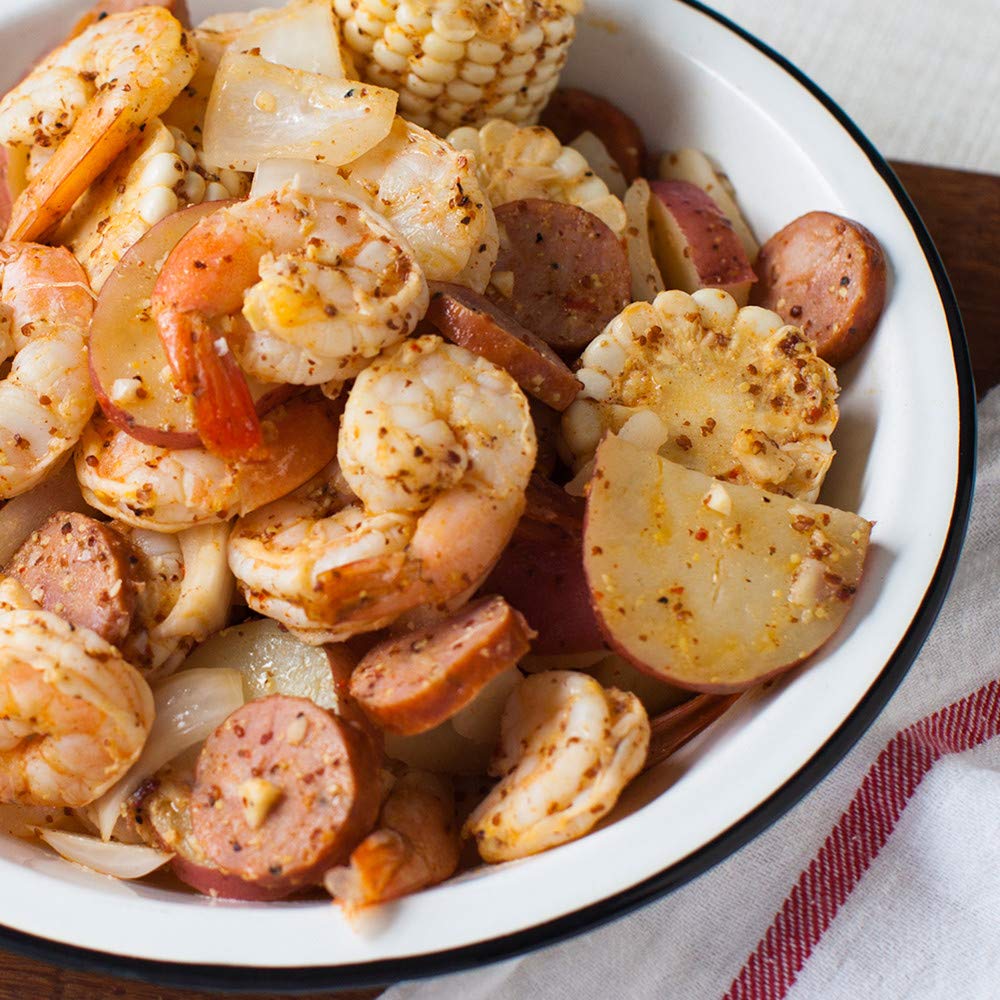 Zatarain's Pro Boil with corn and potatoes ready to elevate a seafood boil gathering.
