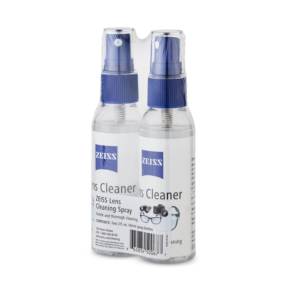 ZEISS lens cleaning spray top cap close-up, travel-friendly design