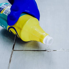 Clean grout lines on tile floor after treatment with Zep