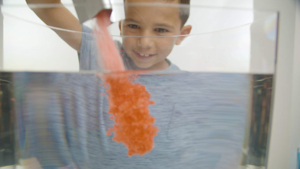 Zimpli Kids Crackle Baff Colours color bath shows vibrant, stain-free play water transformation.