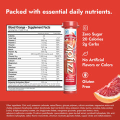 Zipfizz energy hydration bottle with glass ready to sip during workouts.