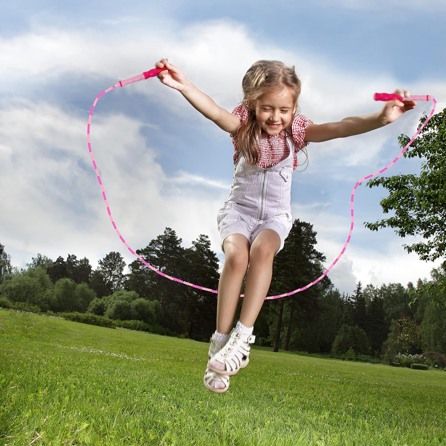 ZOCY jump rope purple and pink handles, ergonomic grip for comfortable training.