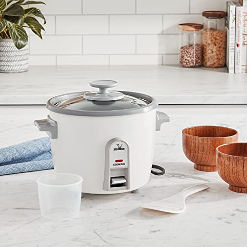 Zojirushi 3-Cup Rice Cooker serving spatula for quick serving.