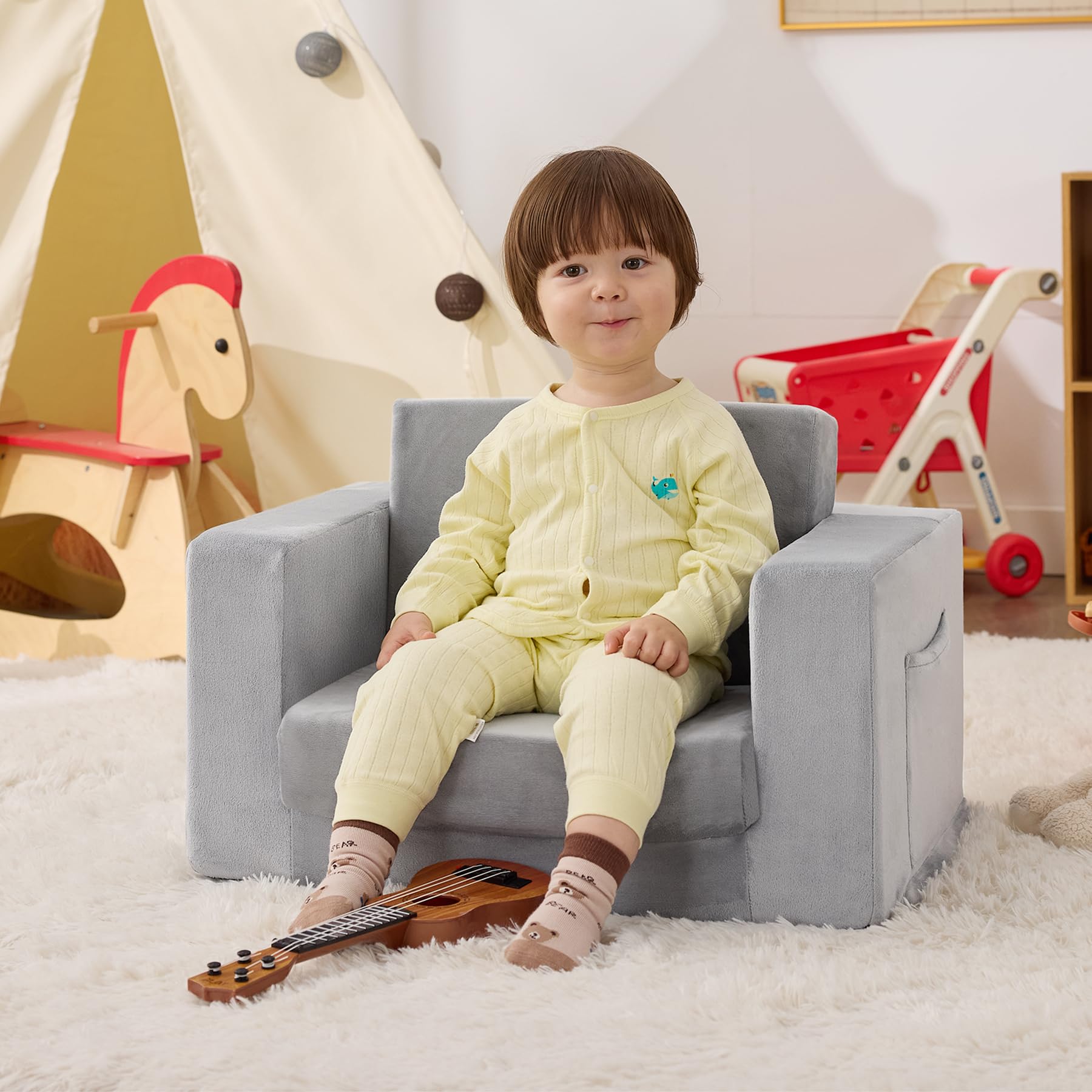 Zorvoxz Kids Couch unfolded recliner mode creates a cozy lounge for playtime.