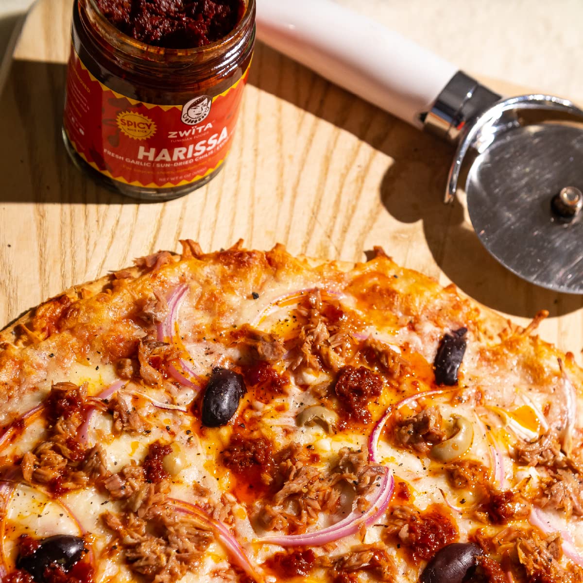 Zwita Spicy Harissa enhances sandwiches and marinades with heat and depth